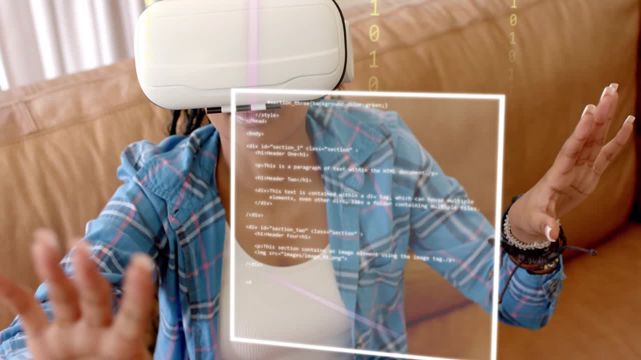 Woman sitting on tan couch with VR headset, reaching, initiating tech UI, swiping and selecting