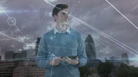 Animation-of-caucasian-businessman-using-tablet-and-network-of-connections-over-cityscape