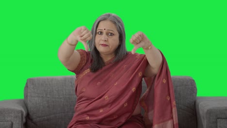 Disappointed-Indian-old-woman-showing-thumbs-down-Green-screen