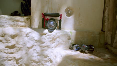 scuba diving gear and waterproof camera drying under the sun after a deep sea dive