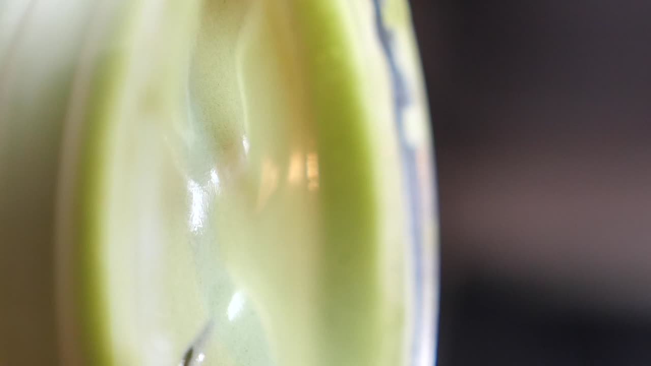 Green smoothie with straw