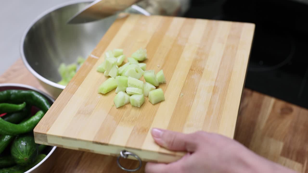 Chopped cucumbers on a cutting board