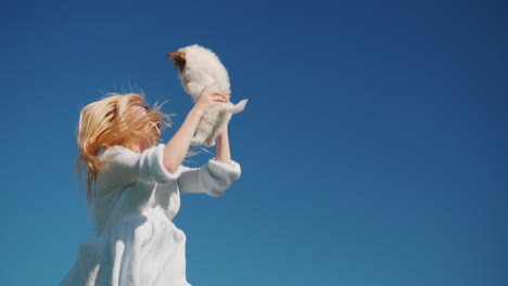 Young-Woman-Jumping-With-Puppy
