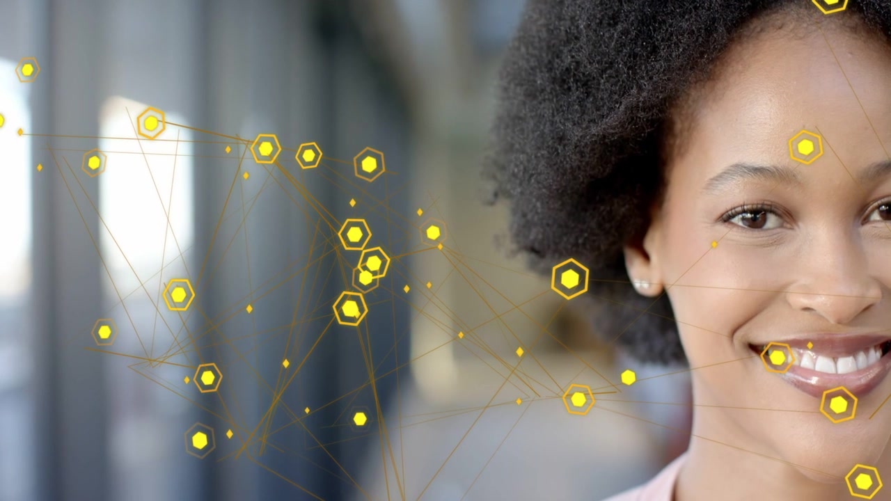 Woman in tech holding gaze blinking shifting as yellow hex nodes drifting across face causing smile