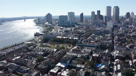 wide aerial panning shot of the french quarter and downtown new orleans