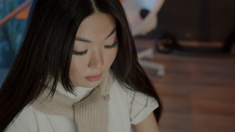 young woman studying or working at a desk