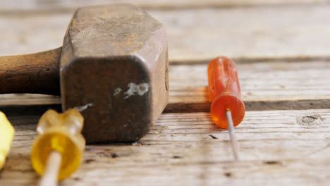 Work-tool-on-wooden-plank