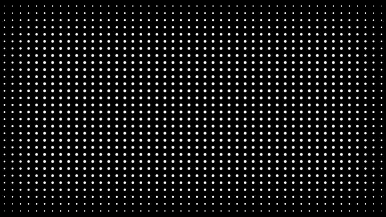 White polka dots against black background. Concentric growing circles seamless loop transition