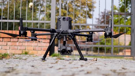 large drone taking off from ground - static steady shot