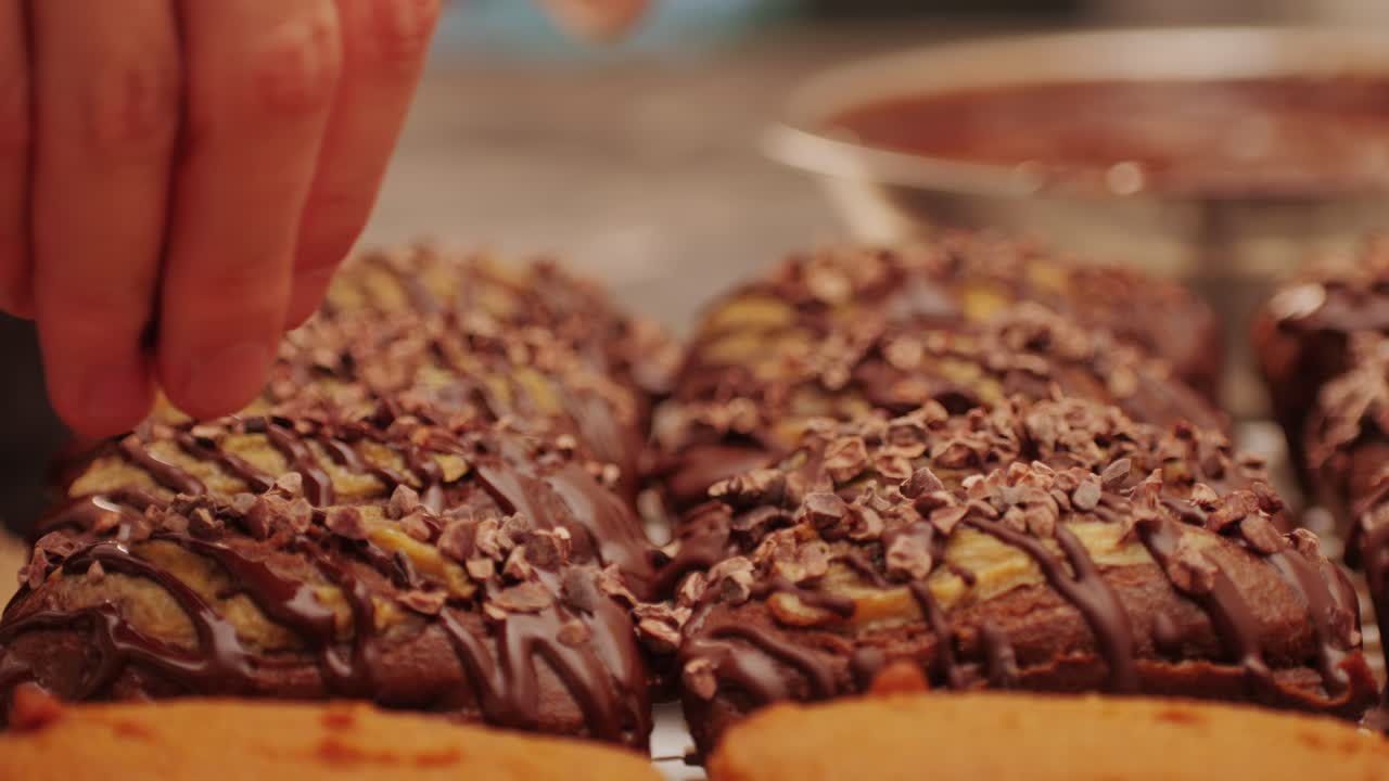 Fresh bake double chocolate banana artesian bread in bakery shop close-up. Artisan bread is making by skill bakers using natural and high-quality ingredients. Food with health and flavour benefits. Sweet breads for dessert and breakfast