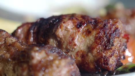 close up of grilled meatballs