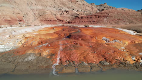 crystal geyser on shore of green river, utah