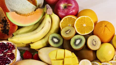 variety of fruits displayed on a white background