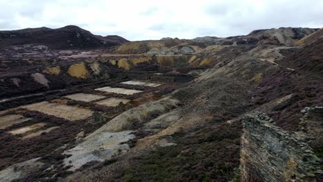 parys mountain rocky copper mining stone ruin quarry aerial reverse view anglesey mine wales uk