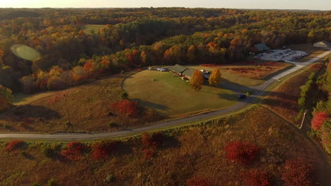 cinematic drone shot of an autumn forest in hocking hills in logan, ohio