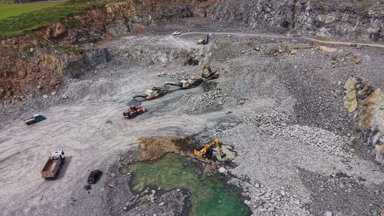 Aerial View of a Large Industrial Quarry with Heavy Machinery