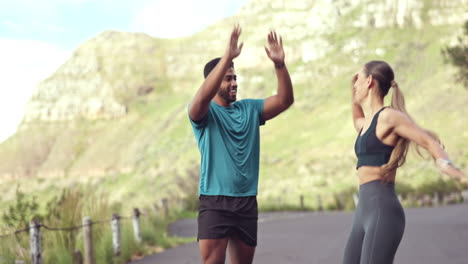 High-five,-fitness-and-running-couple-of-friends