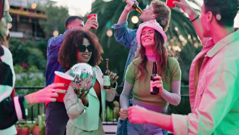 friends celebrating together at an outdoor party with music and drinks