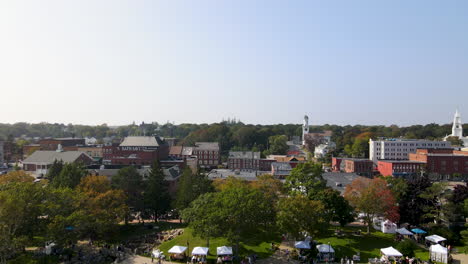 Drone-descent-over-the-City-of-Bath,-revealing-the-waterfront,-and-the-Kennebec-River