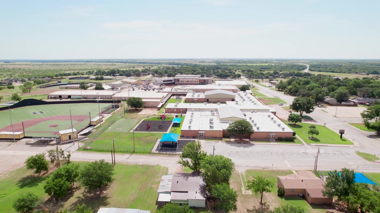 Aerial video of Henrietta, Texas flying approximately east towards Henrietta High school