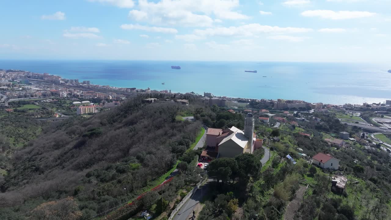 Hilltop church view over Savona with city, sea, ships and a peaceful coastal vibe