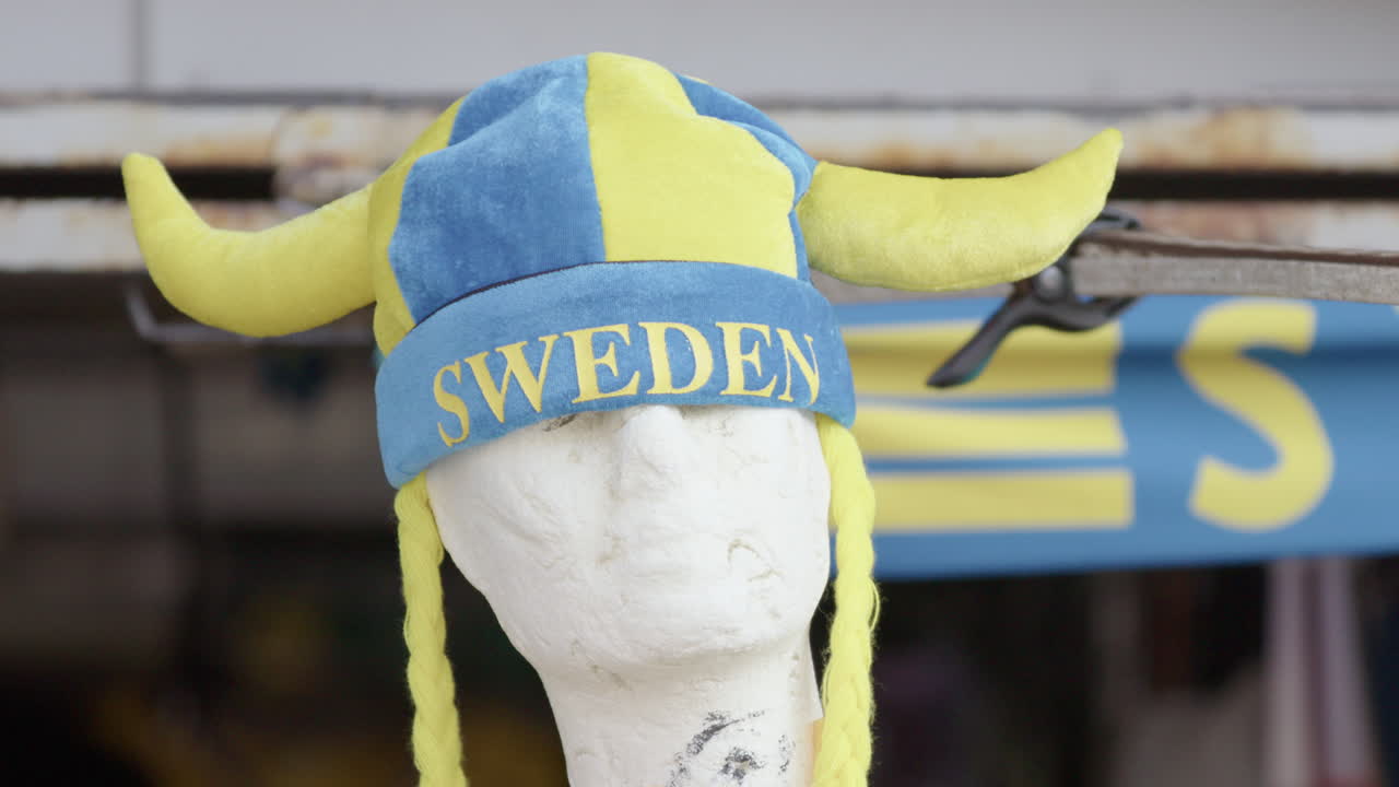 Iconic yellow and blue Sweden horned viking hat for sport fans, tilt-up