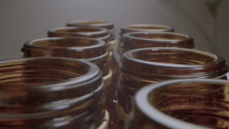 macro shot over empty bottles top without cap