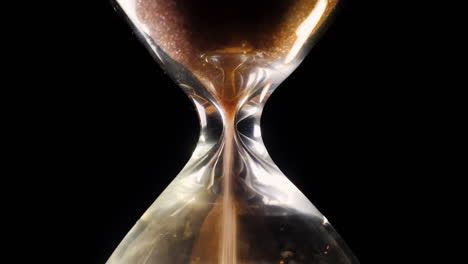 Hourglass-close-up-on-a-black-background