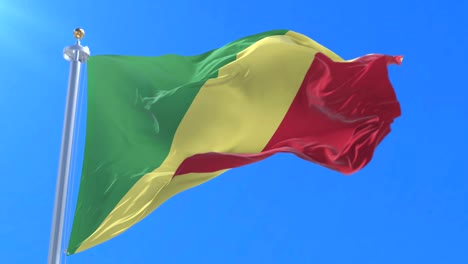 flag of the republic of the congo waving at wind with blue sky in slow, loop