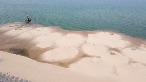 spinning slowly around a ship dredging sand in summer