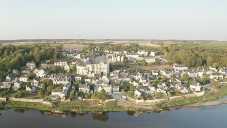 aerial drone point of view of the village of candes saint martin on the confluence of the loire and vienne rivers in central france