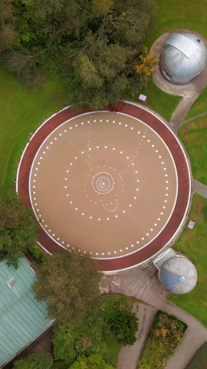 Descending overhead social ratio 60FPS aerial of the groudns at Armagh Planetarium in County Armagh, Northern Ireland. Produced in 1080x1920 with broadcast ready Rec709 color
