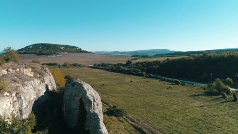 scenic countryside valley with hills and rocks