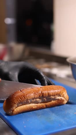 chef preparing hot dogs