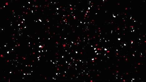 red and white confetti on green screen