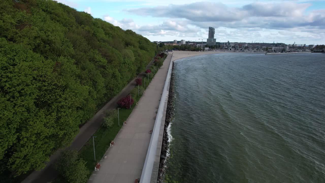 Promenade leading into Gdynia, coastal cityscape on Baltic Sea shoreline