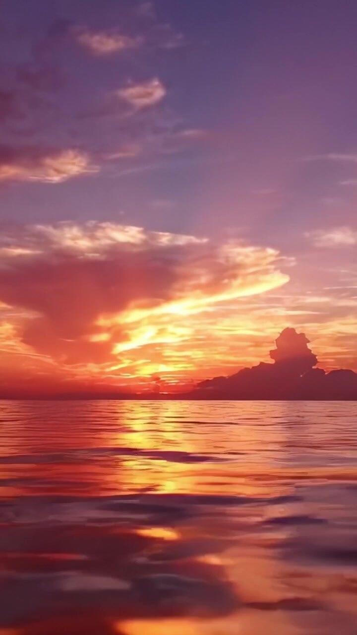 A Stunning Sunset Over Calm Waters: Captivating Horizons of Color Merge With the Peaceful Ocean Reflections Beneath a Vibrant Sky