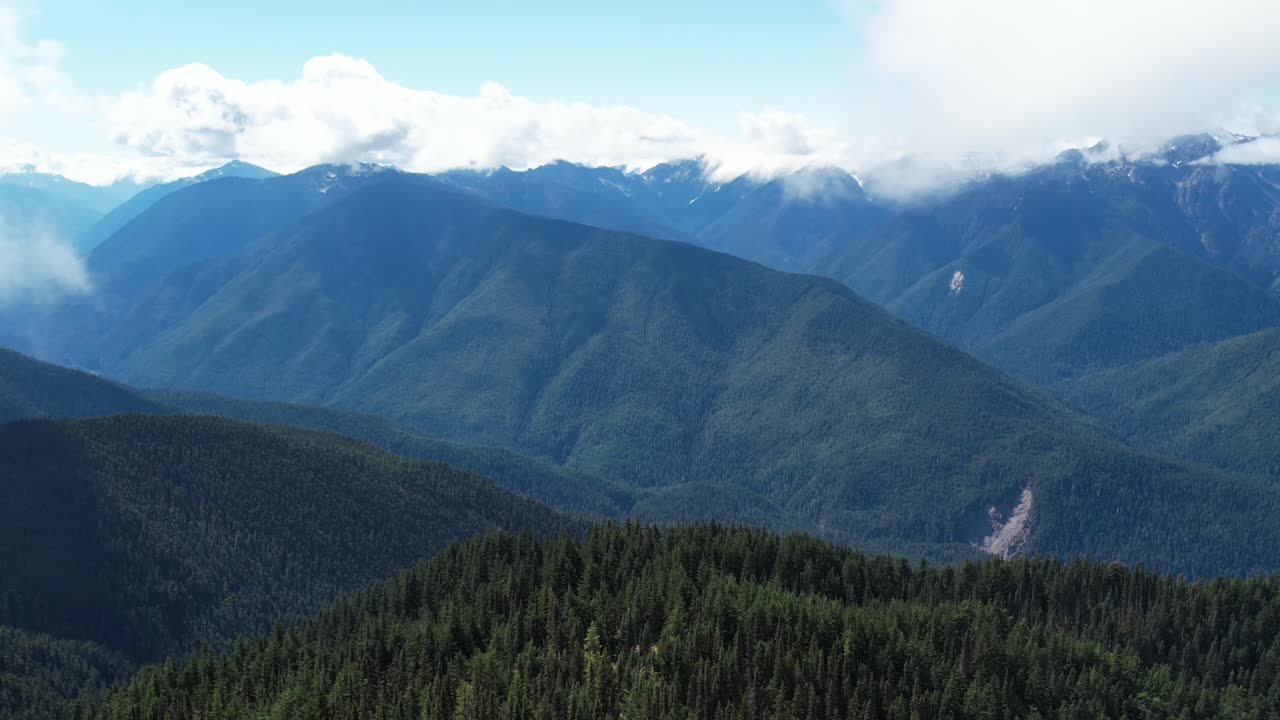 Breathtaking aerial drone footage of Washington's Olympic National Park, featuring majestic mountains and stunning natural landscapes in crisp 4K resolution