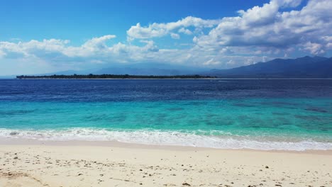 tropical island with palm trees and white beach, caribbean sea with turquoise crystal clear seawater, dramatic sky with clouds