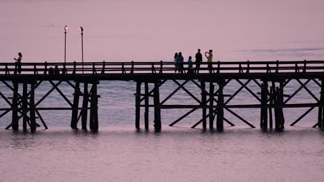 The-Mon-Bridge-is-an-old-wooden-bridge-located-in-Sangkla,-Thailand