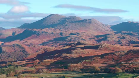 Lake-District,-from-Birker-Fell-aerial-drone-footage-towards-Hardknott-and-Ulpha-Fell---Autumnal-colours