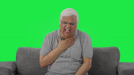anciano indio enfermo que sufre de resfriado y tos pantalla verde