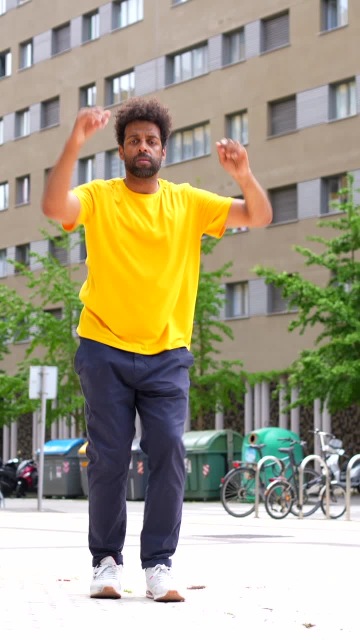 Man Dancing in Urban Setting