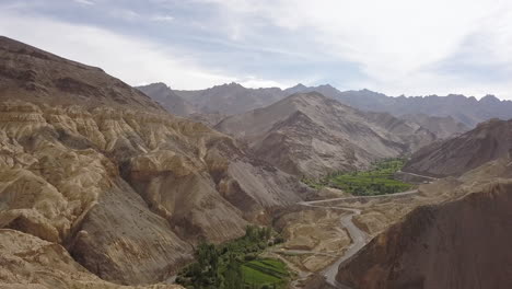 Beautiful-Mountain-Ranges,-Valley,-And-Winding-Road-At-Lamayuru,-Moonland-In-Leh-District-Of-Ladakh,-India