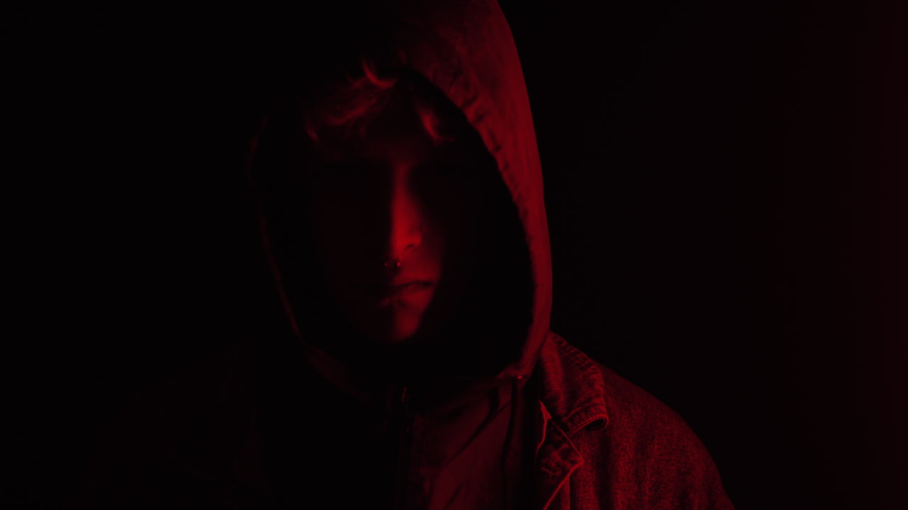 Mysterious Teen in Blue Light