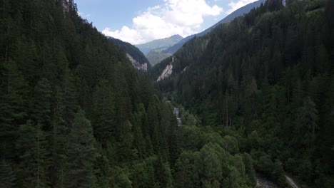 river in swiss alps mountains valley, tree forest, nature switzerland aerial