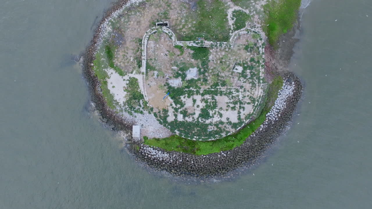 Aerial View of Ruined Structure on an Island