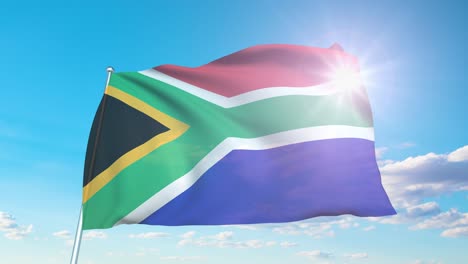 flag of south africa with fabric structure against a cloudy sky (loopable)