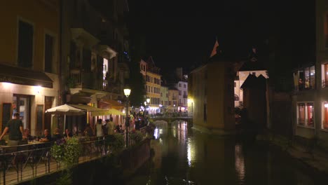 charming night in annecy: canal-side restaurants and city lights