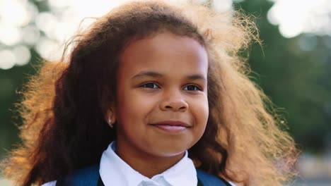 portrait of a young girl in school uniform